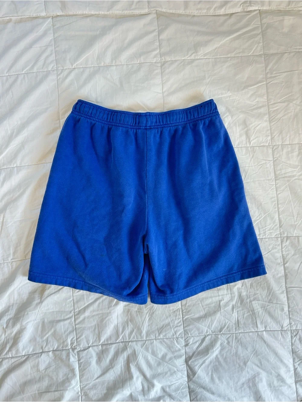 The North Face Men's Royal Blue Athletic Shorts with Red Logo